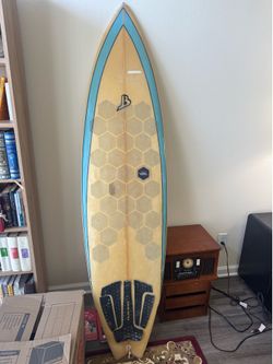 6’9” surfboard 3-fin with van der Waal grip stickers - doesn’t need wax!