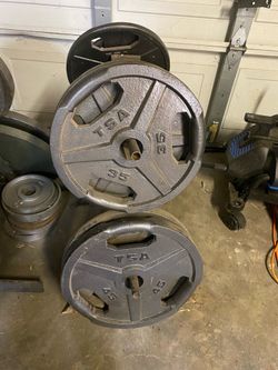 265 pounds of like new Olympic weights from 45 to 2.5
