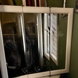 Large 3 Panel Mirrored Medicine Chest. 