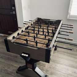 Foosball Table, Complete with 3 balls, in Excellent Used Condition.  Price is Firm.