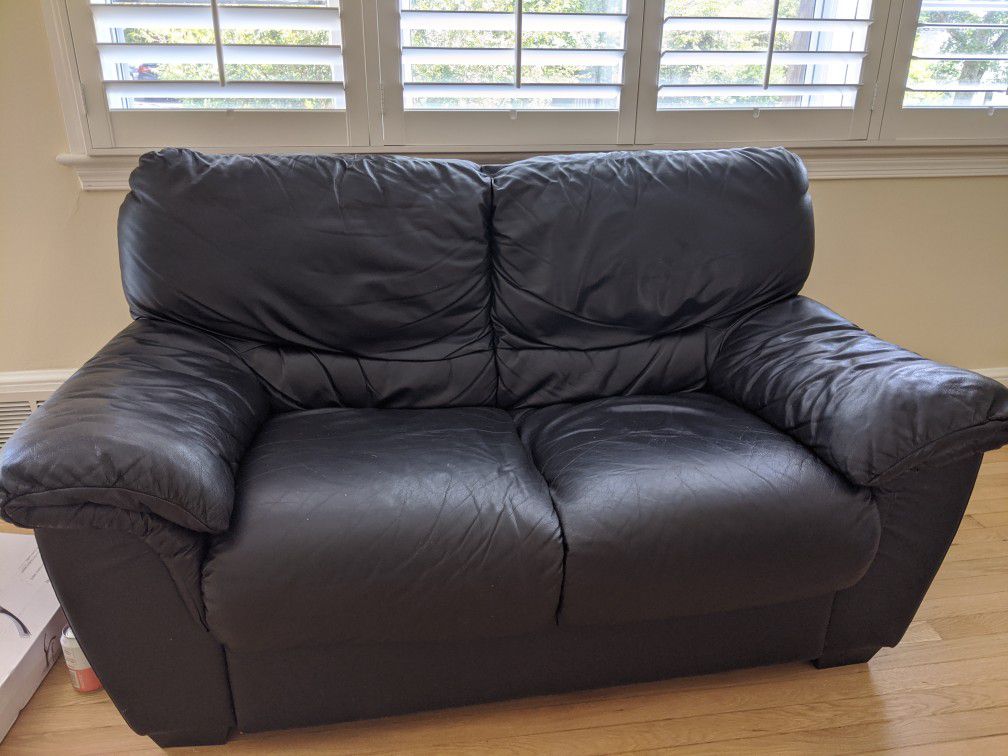 Black leather couch / sofa