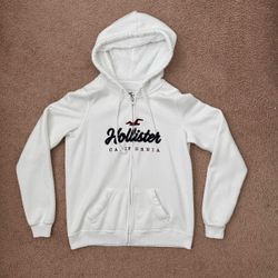 Hollister Co. white zip up hoodie in a size women’s S
