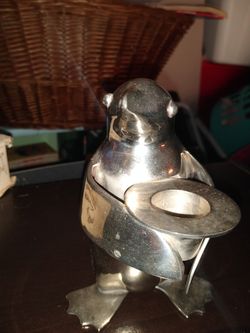 Silver penguin and platters