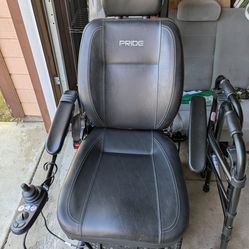 Electric wheelchair and carrier