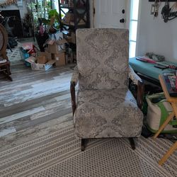 Two Gooseneck Rocking Chairs selling 100 each