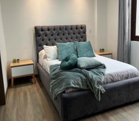 Gray Velvet Upholstered Bed with Tufted Headboard