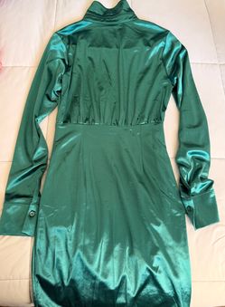 Silk green dress.