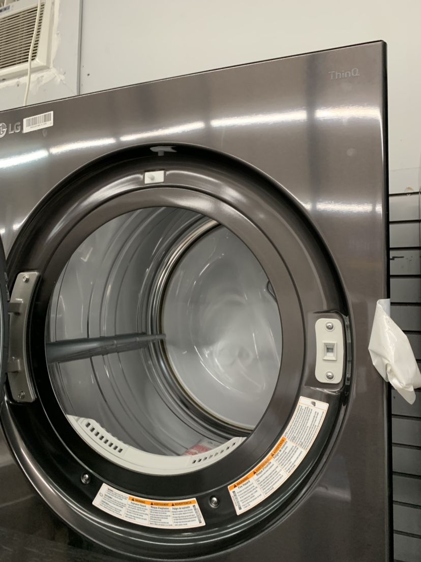 New LG Black Stainless Steel Stacked Washer And Dryer Gas With Steam