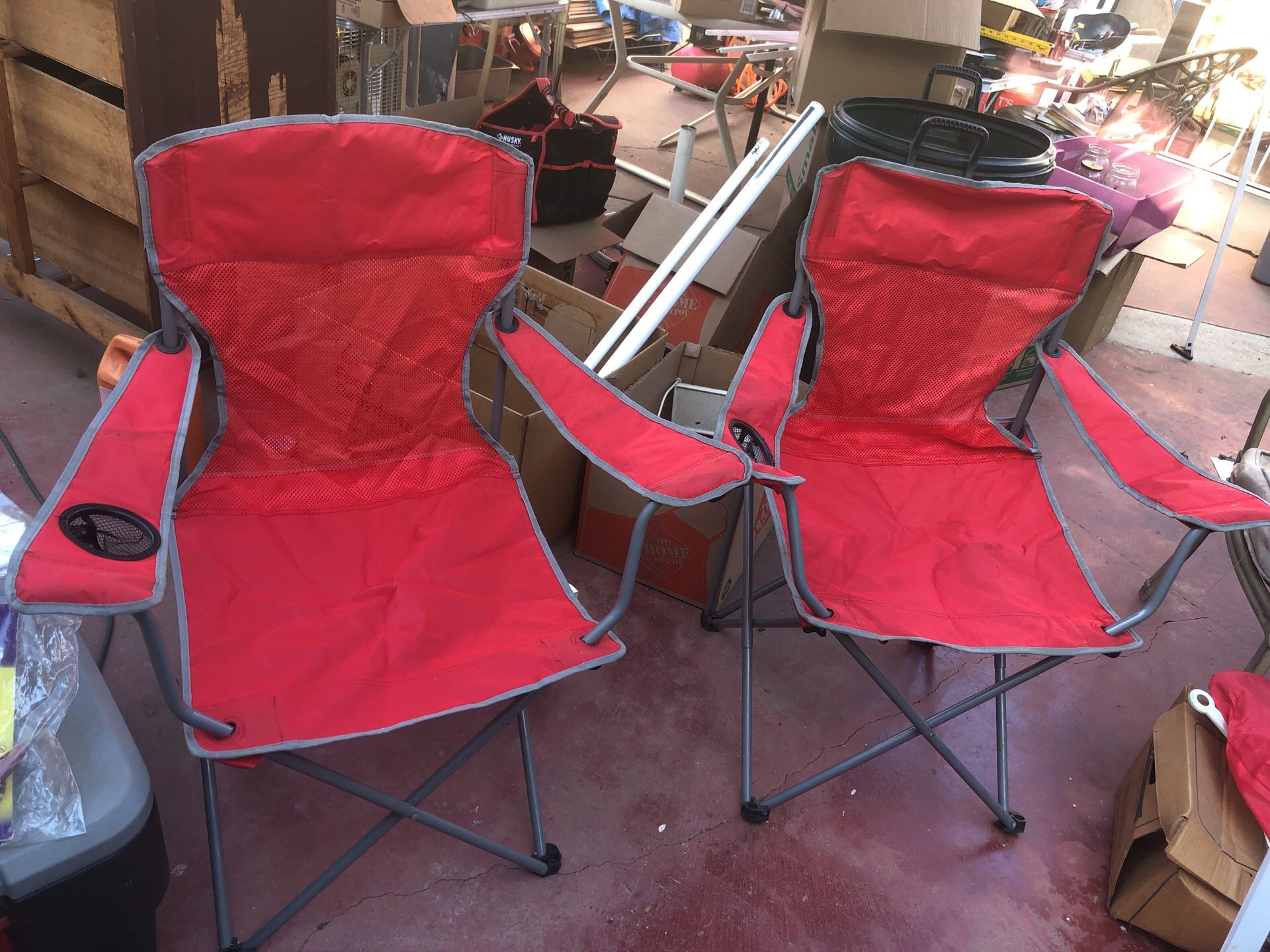 Two red camping chairs