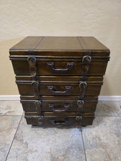 Stacked solid wood luggage chest of four drawers