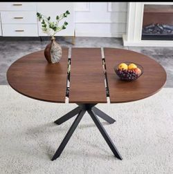 D) Extendable Round Dining Table (43" to 54") Space-Saving Dining Table with Sturdy Metal Legs,for Small Apartment/Living Room color wood $140