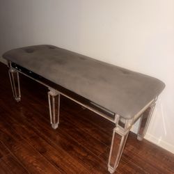 Grey tufted mirror + antique wood bench