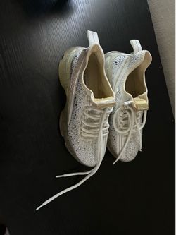 Used white rhinestone Steve Madden sneakers