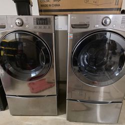 L g washer and Dryer with pedestals gas
