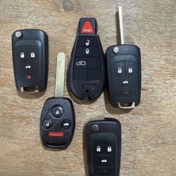 Keys And Remotes Llaves Y Controles Cut and Programmed On Site 
