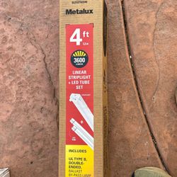 Metalux 4 ft. high-output LED striplight and LED tube set.  Model: SLES2T82G40 Length: 4 ft (1.2 m) Brightness: 3600 lumens Color Temperature: 4000K c
