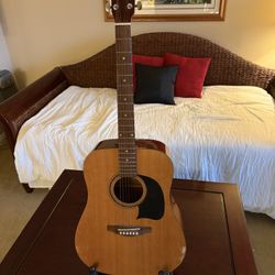 Lyon by Washburn Acoustic Guitar with a built-in onboard tuner