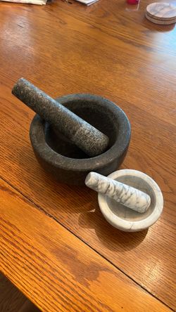 Two mortar and pestles - real stone