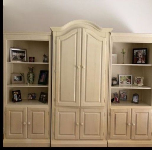 5 piece wood bookcase in whitewash finish 11 feet long and the central piece is 80 inches tall 19 inches deep. Best Offer
