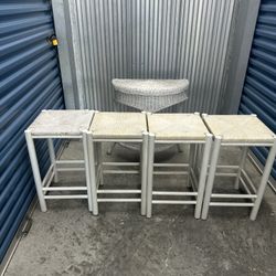 4 wicker bar stools and table
