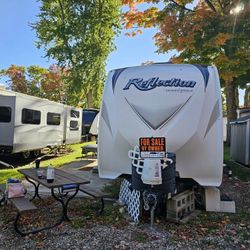 30 FT REFLECTION TRAVEL TRAILER ON LOT 46 AT LAKE SIDE RESORT IN NEW CARLISLE  IND