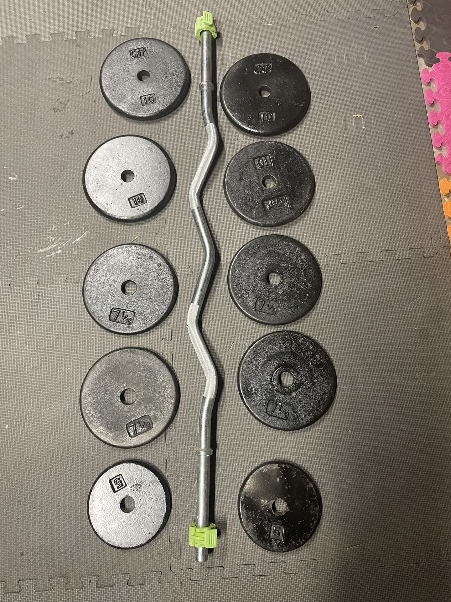 Weights Plates. / Curl Bar. 70 Dollars