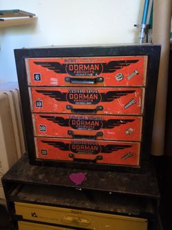 Two vintage Dorman & KAR Metal Cabinets