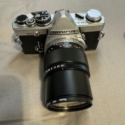 Olympus OM-2N SLR film camera with 135mm F/3.5 Lens