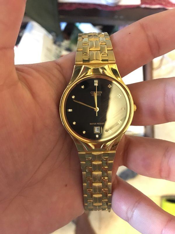 citizen gold watch black face