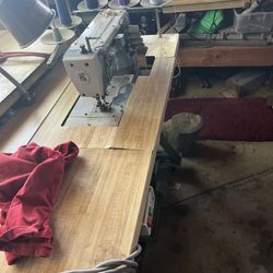 Four-thread sewing machine