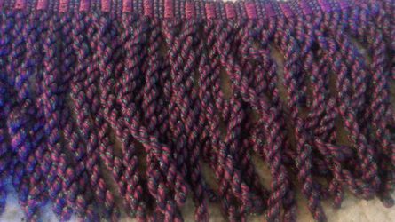 Plum colored upholstery fringe trim