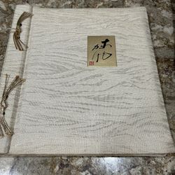 Large, fabric cover scrap book for photos and memorabilia