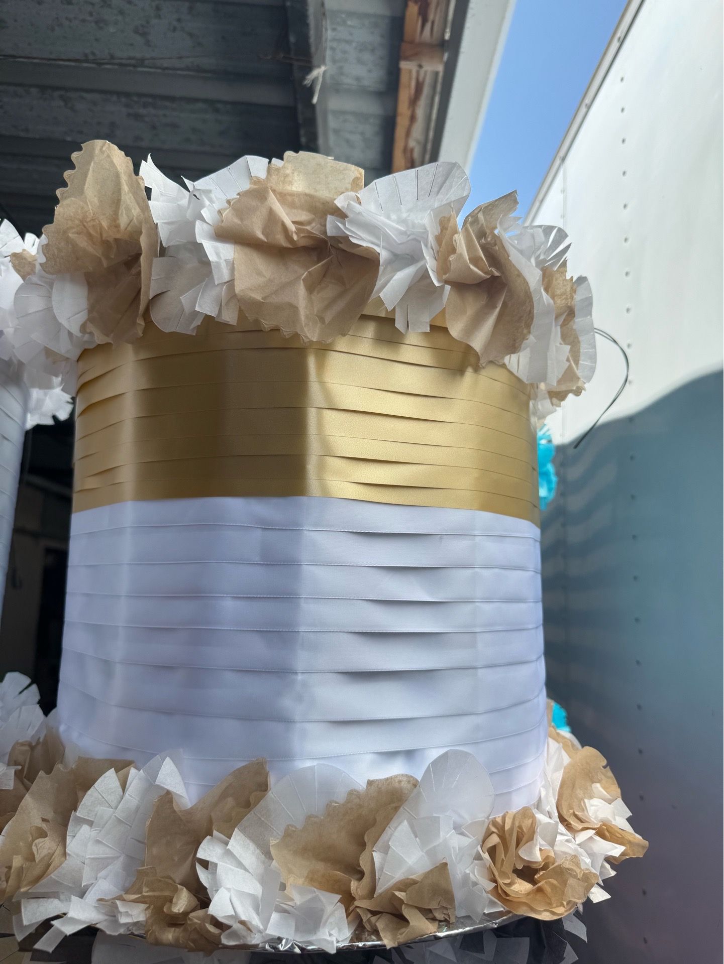 White and gold jiratoria spinning piñata