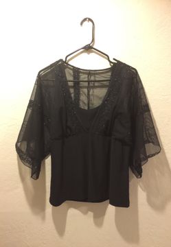 Pretty sheer-sleeved beaded blouse