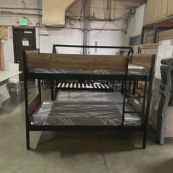 Twin espresso bunk bed. Assembly required.  Assembly not included. Tax included.  Free local delivery. 

Bunk bed only-$220
Bunk bed with 2 twin 6" th