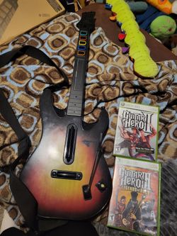 Xbox 360 Guitar guitar and 2 Games both Complete Guitar Hero 2 and Guitar Hero 3 all working perfectly