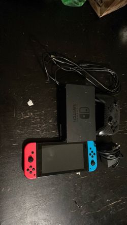 Nintendo switch come with controller and side controllers and ac adapter