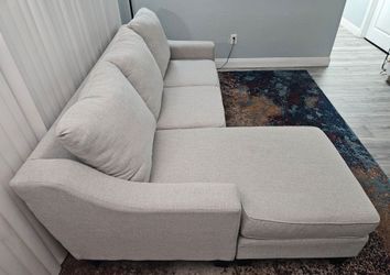 Like new! 10/10, used only for stage performances, Ashley 2-piece sectional sofa, all covers are removable for washing, reversible, smoke and pet free