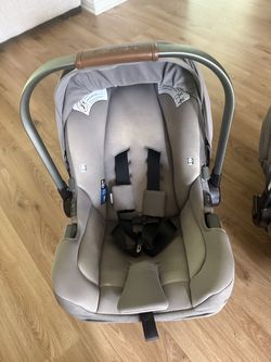 Two Nuna Pipa Rx Car Seats and Bases