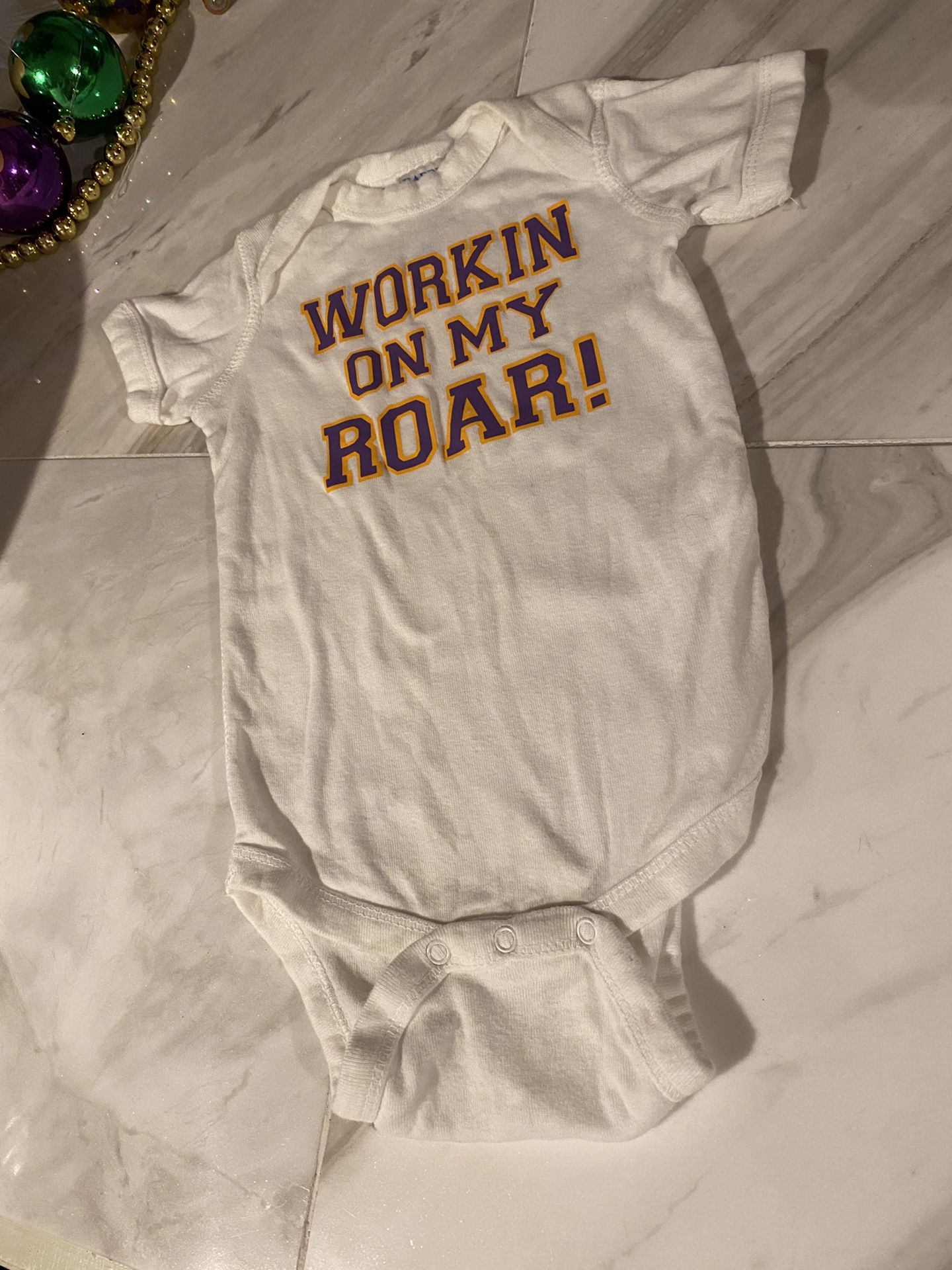 LSU Tigers, Size 6 months "Workin on my roar" Onesie....gender neutral