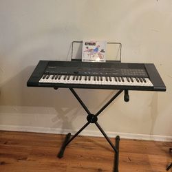 EM303 Roland Electric Keyboard with Stand