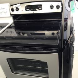 GE 4 Burner Glass Top Black And Stainless Steel Fridge. 1 year Warranty 