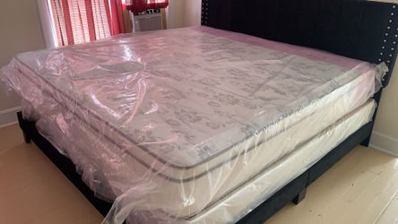 New king mattress and box springs  bed frame is not included