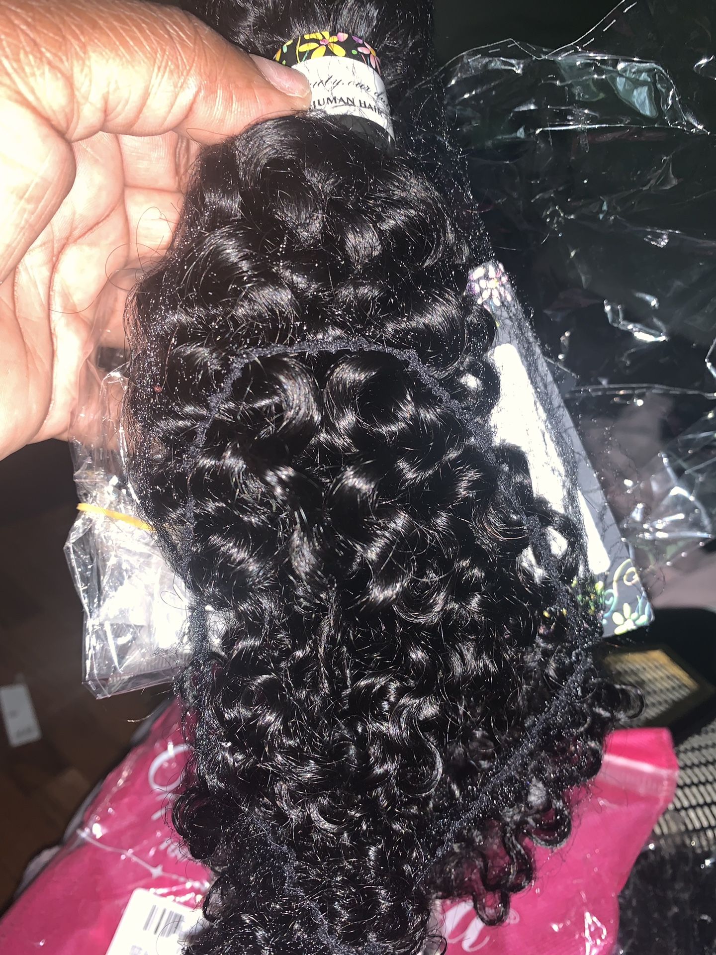 Brazilian deep curly bundles (14,16,18) grade 7A