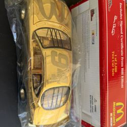 Rare limited-edition Bill Elliott #94 McDonald’s NASCAR 1:24 scale die-cast featuring an authentic 24K gold finish.