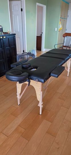 Massage table