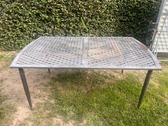 Free large backyard table. You take it away.