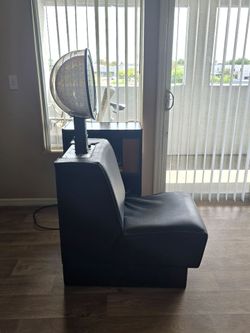 Hooded hair dryer with chair