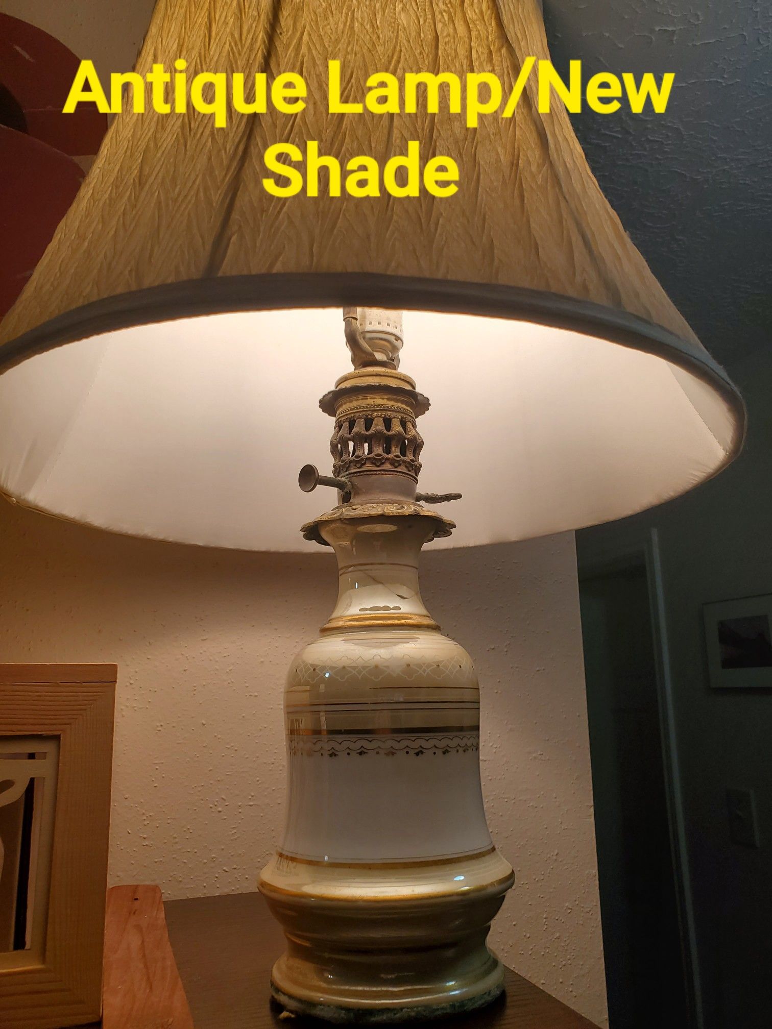 Antique Lamp with barely noticeable crack repaired. Beautiful metal neck embellishment. $45 OBO