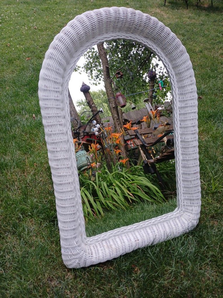 Mirror Surrounded By Wicker